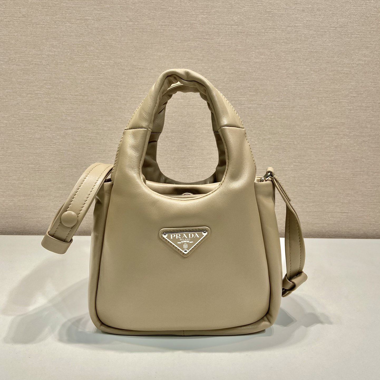 Pra*a top handle bags